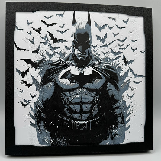 Impression 3D de Batman avec des chauves-souris en arrière-plan