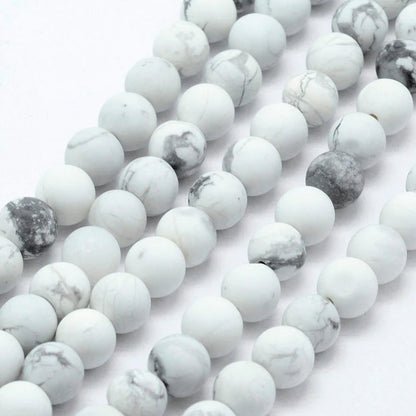 Bracelet perles de pierre de lave howlite blanc mat